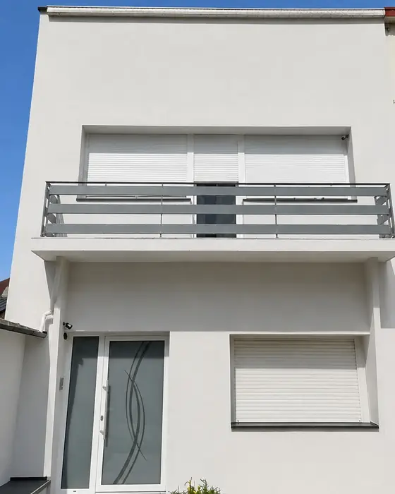 Freyming-Merlebach après travaux : façade enduite blanche, porte d’entrée neuve